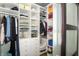 Walk-in closet features built-in shelving and drawers providing ample storage space at 1014 Jackson St, Columbus, IN 47201