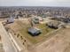 This aerial view highlights the property's location in a developed suburban neighborhood at 1033 Fuller Ln, Shelbyville, IN 46176