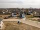 An aerial view showcases the home's location in a residential neighborhood at 1033 Fuller Ln, Shelbyville, IN 46176