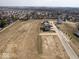 An aerial view showcases several homes in a residential area at 1033 Fuller Ln, Shelbyville, IN 46176