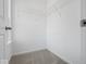 Bright closet with wire shelving, carpeted floor, and white walls, perfect for organization and storage at 1033 Fuller Ln, Shelbyville, IN 46176