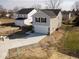New two-story home with gray siding, black shutters and a two-car garage with concrete driveway at 1033 Fuller Ln, Shelbyville, IN 46176