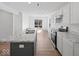 Modern kitchen with island, stone countertops, and stainless steel appliances at 1033 Fuller Ln, Shelbyville, IN 46176