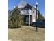 Charming two-story home with brick accents, white trim, a private balcony, and well-maintained landscaping at 12145 Bubbling Brook Dr # 600, Fishers, IN 46038
