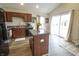 Modern kitchen with dark wood cabinets at 12145 Bubbling Brook Dr # 600, Fishers, IN 46038