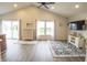 Bright living room boasts vaulted ceilings and an open floor plan at 12145 Bubbling Brook Dr # 600, Fishers, IN 46038