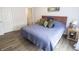 Cozy main bedroom features modern decor and ample natural light at 12145 Bubbling Brook Dr # 600, Fishers, IN 46038