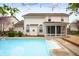 Backyard featuring a sparkling in-ground pool and a spacious wooden deck for entertaining at 12512 Geist Cove Dr, Indianapolis, IN 46236