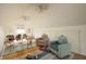 Spacious playroom with vaulted ceilings, colorful carpet, seating, and custom storage at 12512 Geist Cove Dr, Indianapolis, IN 46236