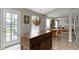 Open concept dining area, with a table for six, seamlessly connected to the kitchen at 12612 Clearview Ln, Indianapolis, IN 46236