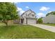 Charming two-story home with a well-manicured lawn and inviting curb appeal at 12612 Clearview Ln, Indianapolis, IN 46236