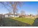 An expansive fenced in backyard with grass at 1319 Brookside Dr, Columbus, IN 47201