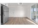 Bright kitchen area featuring stainless steel refrigerator, neutral flooring, and white walls and trim at 1319 Brookside Dr, Columbus, IN 47201