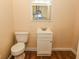 Functional bathroom with a toilet and vanity, providing a practical and efficient space at 1937 N Lasalle St, Indianapolis, IN 46218
