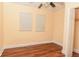 Bright empty bedroom with wood floors and a closet at 1937 N Lasalle St, Indianapolis, IN 46218