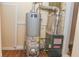 Water heater and furnace, highlighting the home's essential mechanical systems for comfort and efficiency at 1937 N Lasalle St, Indianapolis, IN 46218