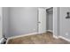Neutral bedroom features tile floors, a closet, and neutral walls at 2016 Woodland Parks Dr, Columbus, IN 47201