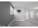 This bedroom features neutral carpet, gray walls, and a TV mount at 2016 Woodland Parks Dr, Columbus, IN 47201