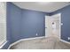 Bright bedroom featuring a large window and a neutral carpet, creating a relaxing space at 2016 Woodland Parks Dr, Columbus, IN 47201