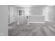 A carpeted hallway features access to a laundry room at 2016 Woodland Parks Dr, Columbus, IN 47201