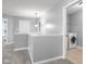 Hallway with carpet and views of the laundry room, great space at 2016 Woodland Parks Dr, Columbus, IN 47201