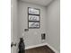 Charming laundry room featuring stylish wall decor and modern flooring at 2171 Mildred Rd, Westfield, IN 46074