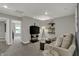 Cozy living room featuring neutral decor, television, and comfortable seating area at 2171 Mildred Rd, Westfield, IN 46074