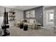 Comfortable living room with stylish seating, media center, and neutral color scheme at 2171 Mildred Rd, Westfield, IN 46074