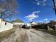 View of back yard with trailer and detached garage at 218 S 5Th Ave, Beech Grove, IN 46107