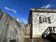 Exterior shot from the side yard shows the siding and windows at 218 S 5Th Ave, Beech Grove, IN 46107
