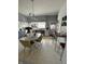 Eat-in kitchen with vintage cabinetry, lighting and breakfast nook at 218 S 5Th Ave, Beech Grove, IN 46107