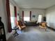 Spacious living room with neutral paint and comfortable seating arrangements at 218 S 5Th Ave, Beech Grove, IN 46107