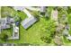 Aerial view of home with spacious yard. The expansive lawn provides a picturesque and private outdoor space at 2230 Mindy Ct, Anderson, IN 46017