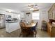 Open dining room area adjacent to the kitchen features ample natural light and flexible layout options at 2230 Mindy Ct, Anderson, IN 46017