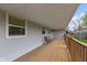 Inviting covered porch with seating, providing an ideal space for relaxation and outdoor enjoyment at 2230 Mindy Ct, Anderson, IN 46017