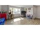 Bright living room with durable floors and large windows providing ample natural light at 2230 Mindy Ct, Anderson, IN 46017