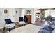 Open-concept living room flows into the dining area, featuring a stylish desk and chair, and plenty of space for entertaining at 265 Goodnight Rd, Martinsville, IN 46151