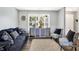 Relaxing living room with plush sofa, accent chairs, and a bright, airy ambiance, creating a welcoming gathering space at 265 Goodnight Rd, Martinsville, IN 46151