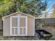 A well-maintained storage shed with neutral color tones, a sturdy frame, and double doors at 265 Goodnight Rd, Martinsville, IN 46151