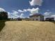Large backyard surrounded by other homes, offering potential for customization and outdoor enjoyment at 3328 Stafford St, Sheridan, IN 46069