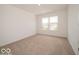 This bedroom features carpeting and a window providing natural light at 3328 Stafford St, Sheridan, IN 46069