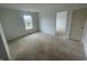 Cozy bedroom with ample space, a large window, and neutral tones, ready for personalization at 3328 Stafford St, Sheridan, IN 46069