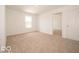 This bedroom has neutral carpeting and a window providing natural light at 3328 Stafford St, Sheridan, IN 46069