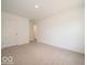 This bedroom offers neutral carpeting and closet access at 3328 Stafford St, Sheridan, IN 46069