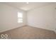 A carpeted bedroom with a window allowing natural light at 3328 Stafford St, Sheridan, IN 46069