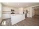 Modern kitchen features an island, stainless steel appliances, and plenty of cabinet space at 3328 Stafford St, Sheridan, IN 46069