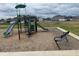 Community playground featuring slides, climbing structures, and a bench in a Gathering-friendly neighborhood at 3328 Stafford St, Sheridan, IN 46069