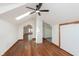 Spacious attic featuring hardwood floors, arched doorways, and unique architectural details at 3750 Totem Ln, Indianapolis, IN 46208