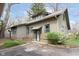Charming home featuring neutral siding, green trim, and ample windows, complemented by a well-maintained exterior at 3750 Totem Ln, Indianapolis, IN 46208