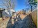 The backyard space offering potential for outdoor activities and landscaping at 3751 N Sadlier Dr, Indianapolis, IN 46226